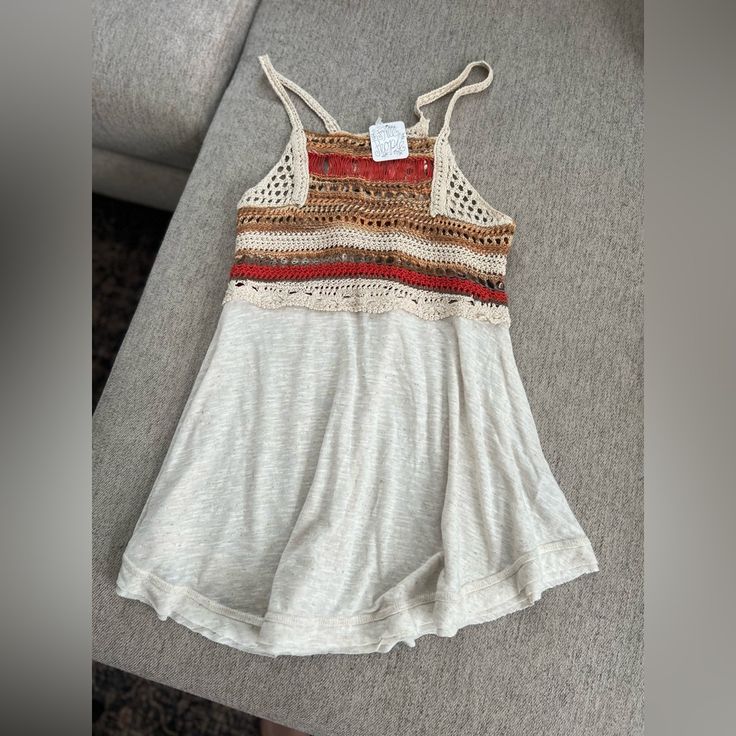 Brand New Flowy Tank Top. The Top Half Looks Like It’s Crocheted. Size X-Small From Free People Casual Crochet Top For Fall Vacation, Beige Cotton Crochet Top For Summer, Casual Summer Crochet Top With Crochet Trim, Casual Fitted Top With Crochet Trim, Beige Cotton Crochet Top For Vacation, Casual Crochet Trim Top For Summer, Casual Knit Top For Beach, Casual Knit Top With Crochet Trim For Fall, Casual Crochet Trim Knit Top For Fall