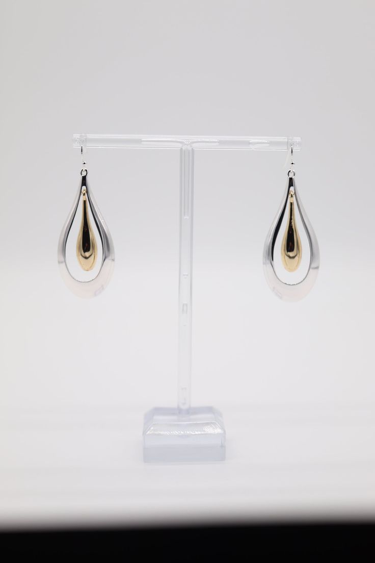 These elegant Double Teardrop Earrings are beautiful to wear with any outfit! They're sure to turn heads wherever you go. Chic Metal Teardrop Drop Earrings, Elegant Metal Drop Earrings, Trendy Teardrop Earrings For Formal Occasions, Trendy Formal Teardrop Earrings For Pierced Ears, White Metal Teardrop Earrings, Trendy Teardrop Dangle Earrings For Pierced Ears, Chic Teardrop Pierced Earrings, Nickel-free Dangle Drop Earrings, Trendy Teardrop Dangle Earrings