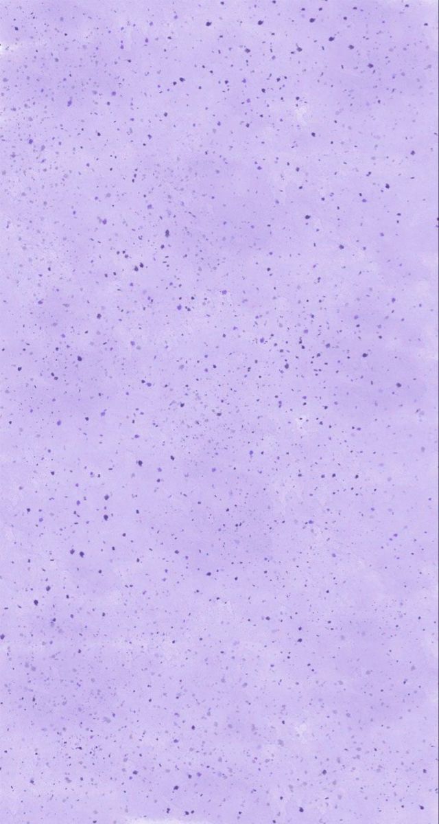 a purple background with small dots on it