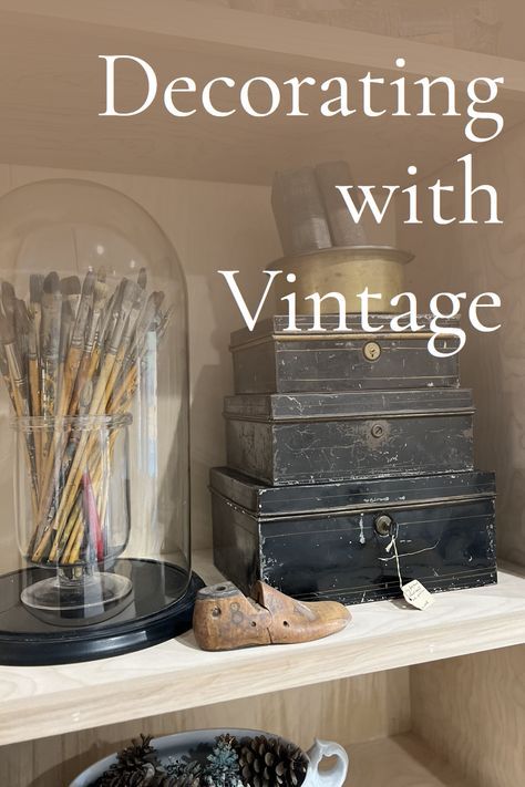 there is a shelf with various items on it and the words decorating with vintage