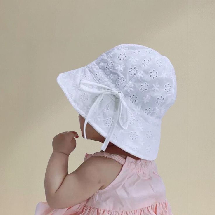 Gorgeous Baby/Toddler Cotton Broderie anglais hat sun hats Available in White or Pink and can be personalised with a small initial done in premium quality vinyl - Please state in the personalisation box what Initial you would like and also if you would like Pink, Mint Green or White Initial I cannot do a name on these due to the broderie anglais design 2nd designs in White, a fixed bow at the front or a tie bow at the side which can adjust the size of the hat The pink is just the tie at the side Cute White Bucket Hat For The Beach, Cute White Baptism Hat, Cute White Bucket Hat For Beach, White Cotton Bonnet For Spring, Cute White Bonnet With Curved Brim, White Adjustable Hat For Baptism, Spring White Cotton Bonnet, Cute White Mini Hats For Summer, Cute White Bucket Hat For Spring