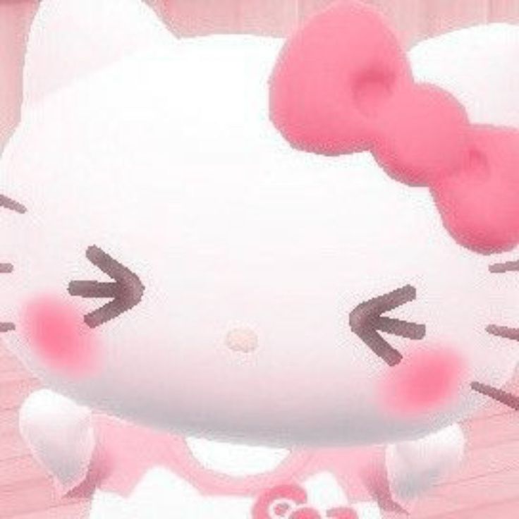 an animated hello kitty with a pink bow on her head, standing in front of a wooden floor