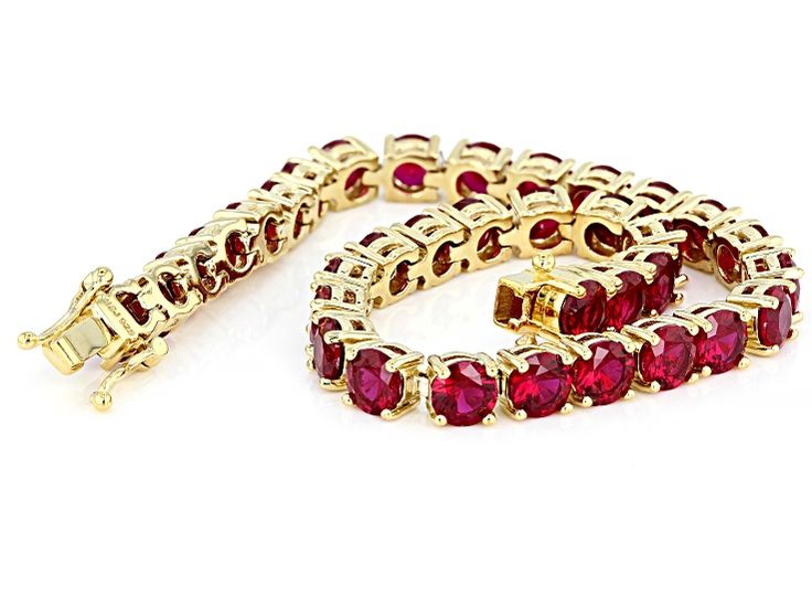 Pre-Owned Scott’s holiday collection 17.46ctw round lab created ruby 18k yellow gold over sterling silver bracelet. Measures approximately .19"W. Hidden box clasp..  This product may be a customer return, vendor sample, or on-air display and is not in its originally manufactured condition.  It may not be new.  In some instances, these items are repackaged by JTV. Red Lab, Formal Outfits, Garnet Jewelry, Box Clasp, Broken Chain, Pearl Strands, Ruby Gemstone, Romantic Gift, Sterling Silver Bracelet