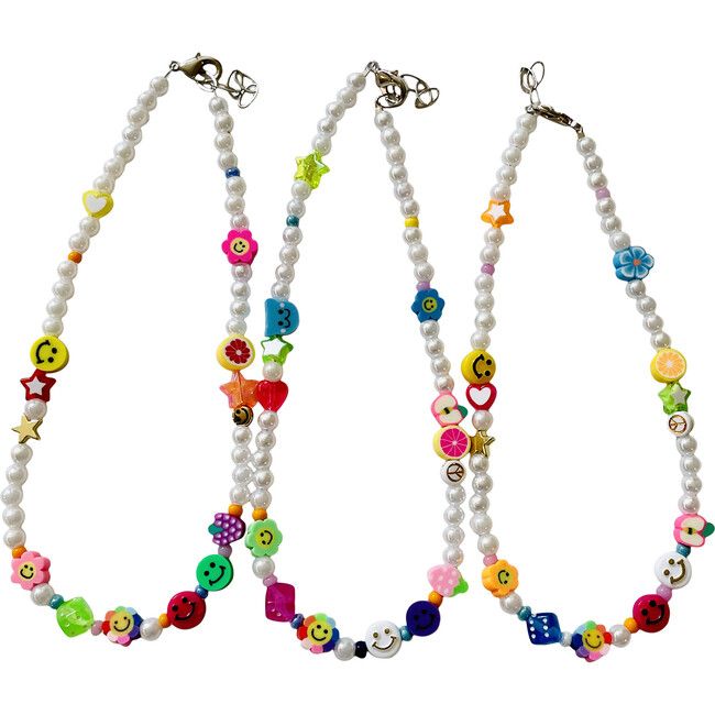 This adorable necklace features a medley of mixed beads with a personality. Pair with the matching bracelet for the ultimate back to school style! Measures 13'' with an extender. Each product is individually hand-made and unique. Beads will differ from the picture. | Risa's Pieces | Happy Beaded Necklace (Multicolor, One Size)  |  Maisonette collects the best children’s products from around the world (unlike Zulily, Etsy, The Tot, Farfetch Kids, Childrensalon, Crate and Kids, Kohls, Wayfair, Buy Adjustable Multicolor Charm Necklace For Birthday, Adjustable Multicolor Charm Necklaces For Birthday, Adjustable Colorful Beads Necklace For Birthday, Playful Multicolor Jewelry For Everyday Wear, White Playful Friendship Necklace, Playful White Friendship Necklace, Casual Multicolor Necklaces For Friendship, Playful Personalized Adjustable Necklaces, Personalized Adjustable Playful Necklaces