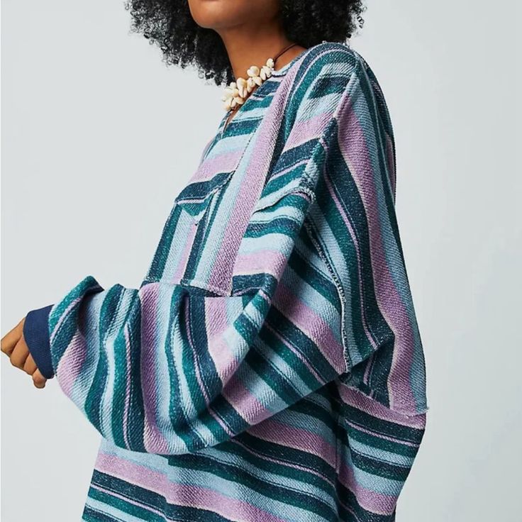 So Effortlessly Essential, This Staple Sweatshirt Is Featured In A Beachy, Relaxed Fit And Classic Striped Design With Raw Seaming, Dropped Shoulders, And Lower Back Hem For Added Shape. Relaxed, Oversized Fit Striped Relaxed Fit Long Sleeve Outerwear, Striped Long Sleeve Outerwear With Relaxed Fit, Purple Relaxed Fit Long Sleeve Sweater, Oversized Long Sleeve Purple Top, Oversized Purple Long Sleeve Top, Multicolor Relaxed Fit Long Sleeve Sweater, Multicolor Long Sleeve Relaxed Fit Sweater, Oversized Striped Long Sleeve Sweatshirt, Oversized Multicolor Hooded Top