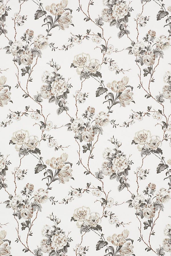 a white and grey floral wallpaper with small flowers on the top, in various sizes