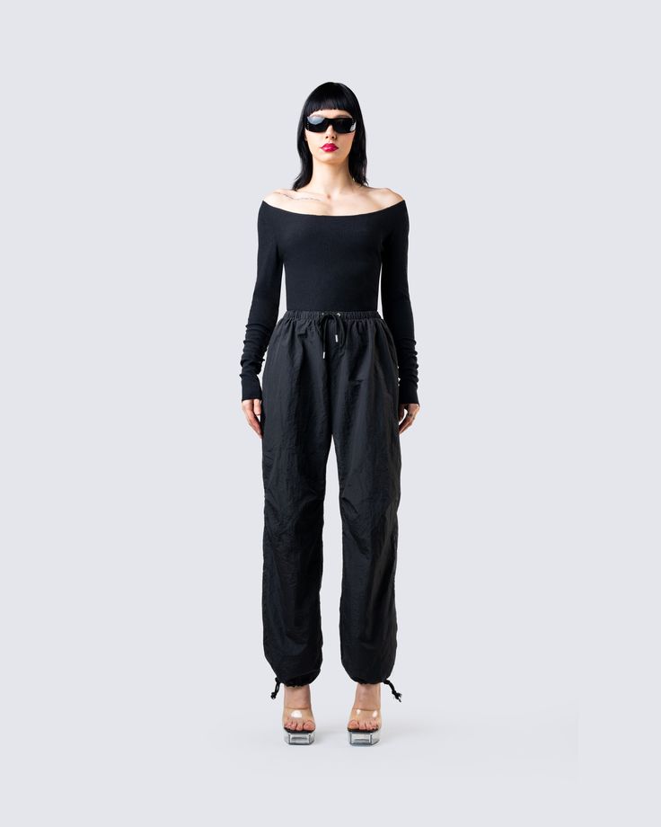 Turn an everyday look into something they will all be eyeing in this set 🖤 Pair the perfect black off-shoulder top with our black parachute pants for the perfect monochromatic look 😍 Edgy Black Parachute Pants, Chic Black Parachute Pants For Summer, Chic Black Summer Parachute Pants, Chic Black Parachute Pants For Fall, Versatile Black Parachute Pants For Spring, Black Parachute Pants, Fuzzy Skirt, White Corset Dress, Denim Pleated Skirt