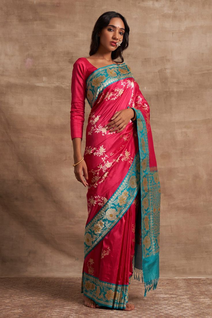 Fuchsia handloom saree with gold zari jaal floral motifs, Meenakari work, firozi border and crafted in Kadhua and Kadiyal.
Components:1

Fabric:Base Fabric Pure Silk
Color:Pink
Crafts used Kadiyal, Jangla, Meenakari and Kadhua
Note: Blouse worn by the model is not for sale - Aza Fashions Pink Tussar Silk Traditional Wear For Reception, Pink Zari Weaving Dupatta For Reception, Pink Tussar Silk Saree For Reception, Pink Tussar Silk Dupatta For Reception, Traditional Handloom Dupatta For Reception, Traditional Handloom Wear For Reception, Handloom Traditional Wear For Diwali Reception, Handloom Traditional Wear For Reception And Festivals, Handloom Traditional Wear For Receptions And Festivals