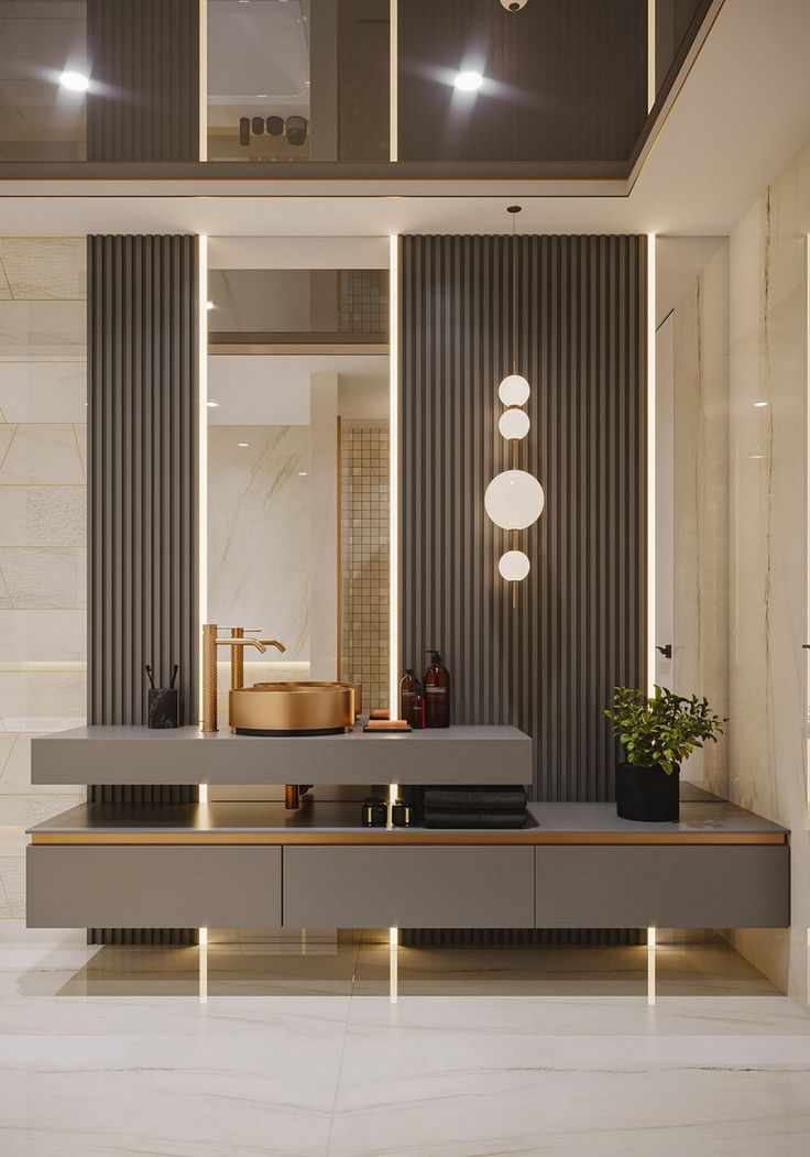 a modern bathroom with marble flooring and walls, along with lights on the ceiling