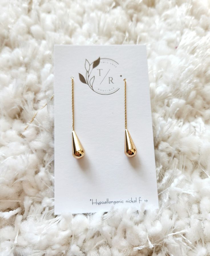 the Miranda 18k Gold threader earrings with teardrop amazing pair of minimalist threader earrings, each with a dainty 18k gold plated teardrop. These earrings are simple & light enough for everyday wear or for dressing up! • Thread Through - Can be worn in multiple different styles & threaded through a second piercing. Size: 83x6.5mm approx. Material: 18k gold plated brass, does not tarnish easily Gold Teardrop Linear Earrings In 14k Gold Filled, Gold Teardrop Linear Earrings 14k Gold Filled, Delicate Chain Drop Threader Earrings For Everyday, Everyday Threader Drop Earrings With Delicate Chain, Everyday Drop Threader Earrings With Delicate Chain, 14k Gold Filled Teardrop Linear Earrings For Everyday, Everyday Yellow Gold Teardrop Threader Earrings, Everyday Long Drop Threader Earrings With Adjustable Chain, Everyday 14k Gold Filled Teardrop Linear Earrings