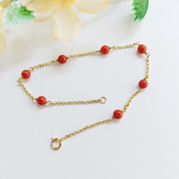 A k14 gold chain bracelet with dispersed coral beads. The bracelet is stackable and very trendy together with other colours. The coral bracelet is delivered in a gift box. Free worldwide shipping with DHL or Fedex. Please message a mobile phone number for delivery purposes. All jewelry is shipped in its appropriate hard box and placed in a bubble envelope. Enviromental duties have been paid to respective countries for packaging waste. www.thelittleshopAthens.etsy.com Coral Beads Jewellery, Red Bracelet, Gold Chain Bracelet, Coral Bracelet, Beads Jewellery, Red Bracelets, Gold Bracelet Chain, Bubble Envelopes, Coral Beads