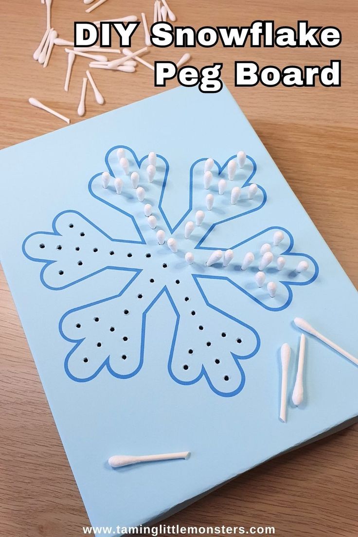 a snowflake peg board is shown with pins and glue to make the snowflakes