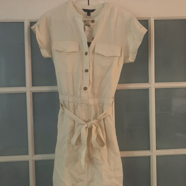 Never Worn Dress With Tags. Classic Button Down Waist Tie Dress With Pockets. Great Neutral Color And Easy Fit. Accepting Offers. Fit S/M Casual Belted Mini Dress For Daywear, Beige Button-up Mini Dress For Daywear, Casual Belted Mini Dress For The Beach, Beige Button-up Midi Dress For Vacation, Beige Button-up Cotton Dress, Beige Linen Shirt Dress With Button Closure, Casual Beige Belted Shirt Dress, Neutral Dress With Button Closure For Daywear, Neutral Dresses With Button Closure For Daywear