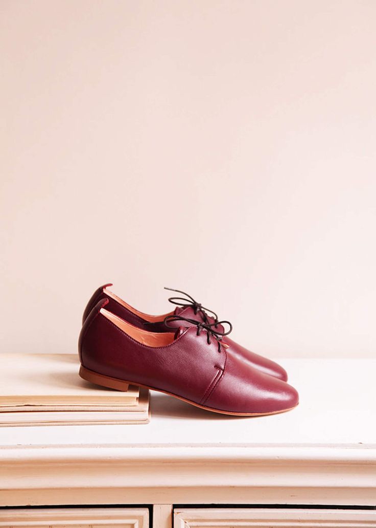 Classic deep burgundy leather Oxford shoes. This pair is the ultimate classic, embracing casual elegance. It matches such a large variety of outfits, absolutely perfect from spring to autumn season. We made our shoes to achieve comfort, durability and high aesthetics. These shoes are truly a wardrobe essential.  * Standard fit & generally runs true to size * The design is super flattering on all feet shapes and sizes * Leather lining with leather soles (3mm) & anti slip rubber heels (6mm) * Slig Classic Burgundy Oxfords With Red Sole, Classic Burgundy Leather Shoes With Rubber Sole, Burgundy Loafers With Rubber Sole And Round Toe, Burgundy Leather Loafers With Red Sole, Burgundy Leather Shoes With Round Toe And Branded Insole, Burgundy Leather Shoes With Branded Insole And Round Toe, Burgundy Oxfords With Rubber Sole And Plain Toe, Burgundy Leather Shoes With Brogue Detailing, Burgundy Leather Brogue Shoes With Round Toe