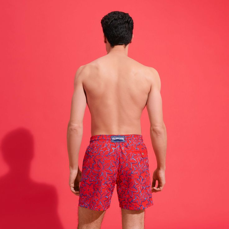 Tiaré flowers can be found in spades on these Mistral Macro Raiatea embroidered swimming trunks. A breath of floral sweetness that takes you to the Polynesian lagoons.Embroidered fabric, numbered limited edition of swim trunks to 245 copiesSwim trunks with elastic waistband with drawstring and silver tips (engraving 925 certified)Side pockets and back pocket with Turtle personnalized round snap buttonTwo back eyeletsSide leg length in size M: 15.6"Men Swim TrunksMen Swim Trunks Macro RaiateaMode Fitted Red Swim Trunks For Beach Season, Red Beachwear Swim Trunks For Swimming, Red Swim Trunks For Beachwear, Red Fitted Swim Trunks For Beach, Fitted Red Swim Trunks For Beach, Red Beachwear Swim Trunks, Father And Son Clothing, Men Swimwear, Silver Tips