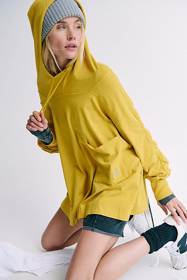 Go effortlessly from the studio to the streets in this hooded layer from our Hot Shot Collection, featuring a soft fabrication, relaxed fit and adjustable hood. **Fit:** Relaxed fit; soft fabrication; adjustable drawstring hood; ribbed sleeve detail **Features:** Soft fabrication, light and airy with a relaxed fit; tapered sleeves with ribbed hem detail; large chest pocket; adjustable drawstring hood **Why We ❤ It:** Perfect for pre- and post-workout layering or lounging around | Hot Shot Hooded Layer Top by FP Movement at Free People, Ember Glow, S Spring Relaxed Fit Top With Double-lined Hood, Spring Hoodie With Kangaroo Pocket, Fall Athleisure Hoodie With Adjustable Hood, Urban Outerwear For Spring Loungewear, Spring Hoodie With Kangaroo Pocket And Relaxed Fit, Relaxed Fit Outerwear With Kangaroo Pocket For Spring, Spring Relaxed Fit Hoodie With Drawstring, Spring Sporty Hoodie With Relaxed Fit, Spring Sporty Hoodie In Relaxed Fit