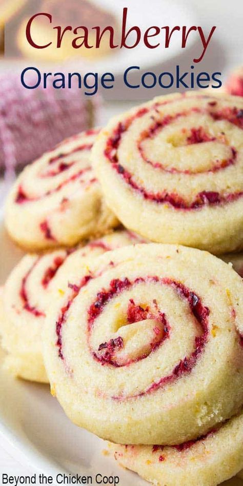 cranberry orange cookies on a white plate