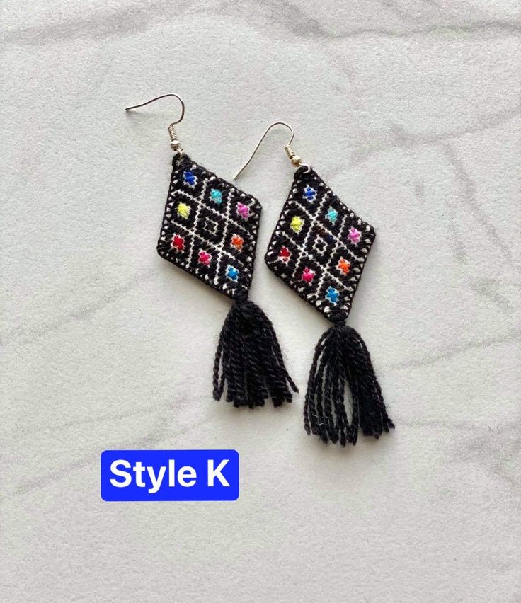 The perfect boho piece of jewelry for any look! These embroidered cloth kite earrings are handmade by artisans in Chiapas, Mexico. Each earring is about 3 inches long, extremely light, and come with an plastic earring back. Please select your choice of color at checkout. All items are made with love by talented skilled artisans. Because of the handmade nature of the items, they may have some imperfections. However, this is what makes them one of a kind! Multicolor Embroidered Bohemian Earrings, Bohemian Beaded Embroidered Earrings For Festivals, Bohemian Embroidered Earrings For Festive Occasions, Bohemian Embroidered Festive Earrings, Black Embroidered Bohemian Jewelry, Bohemian Black Embroidered Jewelry, Woven Dangle Earrings For Festival, Traditional Woven Multicolor Earrings, Traditional Multicolor Woven Earrings