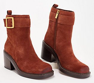 This sophisticated ankle boot is crafted of various leather and suede finishes accented with a leather band and a prominent buckle. Pair them with your wide leg jeans and a refined wool sweater for a polished look. From Vince Camuto. Casual Square Toe Moto Boots For Fall, Casual Moto Boots With Square Toe For Fall, Leather Ankle Heeled Boots For Fall, Chic Winter Moto Boots With Reinforced Heel, Fall Moto Boots With Stacked Heel And Square Toe, Brown Moto Boots With Stacked Heel For Fall, Square Toe Moto Boots For Winter Workwear, Winter Workwear Moto Boots With Square Toe, Fall Workwear Moto Boots With Reinforced Heel