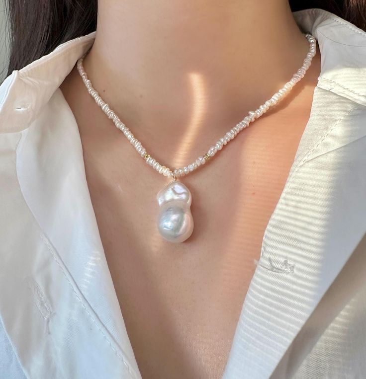 Pure beauty doesn't always need a complex design, and that's especially true for baroque pearls. Each one is uniquely stunning! Choose your one-of-a-kind baroque pearl today  ❣️Important❣️ Each baroque pearl has its own unique shape. Please DM us to select your favorite from the available options. Once you've made your choice, we'll begin crafting your piece. Please note that once created, changes cannot be made. 🤍 MATERIAL 🤍 Freshwater baroque pearls 18k gold plated beads 18k gold - filled ex White Shell Necklace With Pearl Pendant As Gift, Akoya Pearl Pendant Necklace Gift, Baroque Pearl Pendant Long Necklace, Unique Baroque Pearl Drop Jewelry, Pearl Necklace With Pearl Pendant For Her, Pearl Necklace With Pearl Pendant As Gift For Her, Handmade Akoya Pearl Jewelry For Gifts, Handmade Akoya Pearl Jewelry Gift, Baroque Pearl Jewelry With Pearl Charm