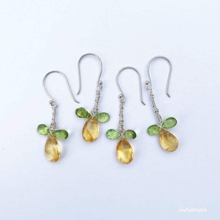 Citrine quartz and peridot gemstone, collected from nature and crafted into sterling silver gem earrings. They will truly enhance your look and make you feel special and beautiful. The spiritual meaning of Citrine is its yellow hues symbolizing the spiritual qualities of joy, abundance, and transmutation. Citrine is also known as the Merchant's Stone, due to its ability to transmute energies quickly and easily, facilitating transfers of energy from one to another. Peridot is often considered a s Family Harmony, Gem Earrings, Spiritual Meaning, Yellow Citrine, Citrine Stone, Peridot Gemstone, Green Peridot, Feel Special, Birthstone Jewelry