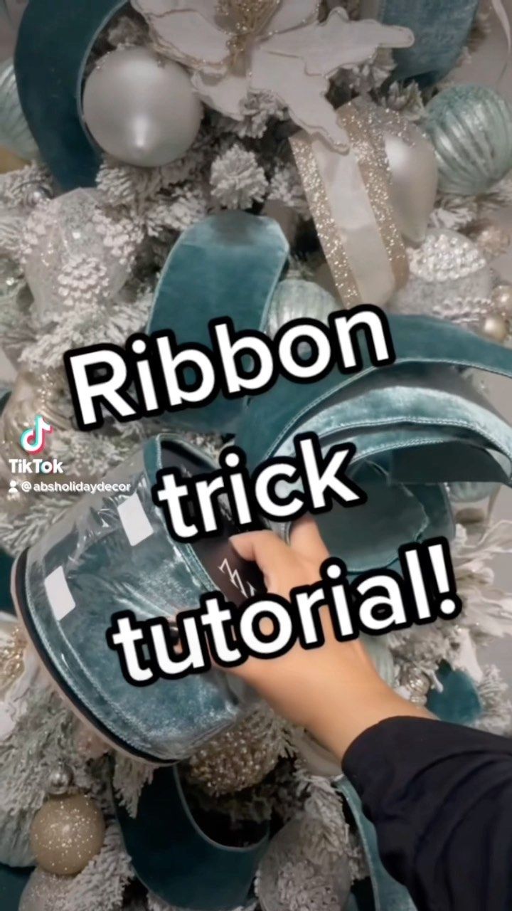 someone is placing their shoes on top of a christmas tree with ornaments around it and the words ribbon trick tutorial