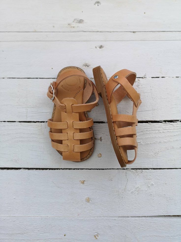 Greek Girls' Gladiator Sandals, Handmade of True Natural Greek Leather. Real Leather. Shipping worldwide from Athens Greece Centimetres: 11__11,6__12,3__13,6__15__16,6__17__17,6__18,3__19__19,6__20,3__21__21,6__22,3__23 EU: 18__19__20__21-22__23-24__25-26__27__28__29__30__31__32__33__34__35__36 Mommy and Me pairs are available for 30% discount. Please visit the below link to purchase both by using 30% discount code MOM30 Parent Company https://www.etsy.com/uk/shop/madammeshushu?ref=search_shop_r Summer T-strap Closed Toe Sandals, Cute Brown Closed Toe Sandals, Brown Sandals With Soft Sole For Beach, Summer Closed Toe Adjustable Sandals, Brown Beach Sandals With Soft Sole, Adjustable Closed Toe Summer Sandals, Closed Toe Adjustable Summer Sandals, Cute Adjustable Closed Toe Sandals, Adjustable Closed Toe Slingback Sandals For Summer