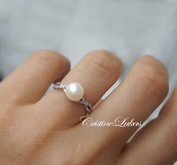 Classic Infinity Ring with Cubic Zirconia Stones & Pearl - Freshwater White Pearl With Sterling Silv Elegant Round Hypoallergenic Pearl Ring, Elegant Hypoallergenic Round Pearl Ring, Elegant White Hypoallergenic Pearl Ring, Elegant Hypoallergenic Pearl Ring, Elegant Hypoallergenic Pearl Promise Ring, Moti Ring, Pearl Ring Design, Natural Pearl Ring, Silver Pearl Ring