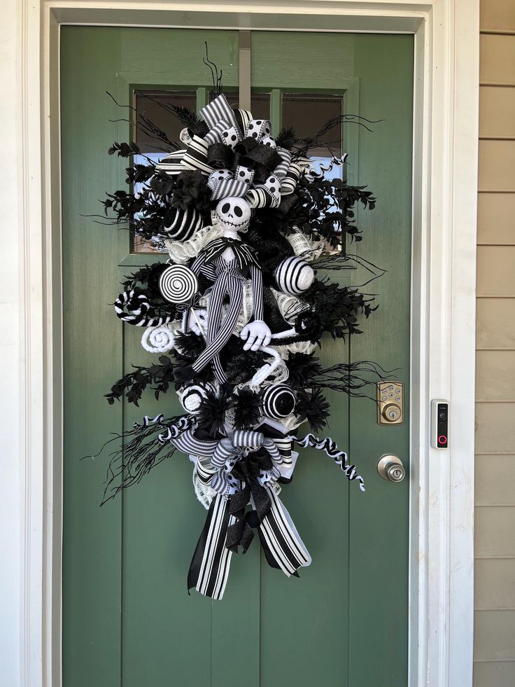 a door decorated with black and white decorations