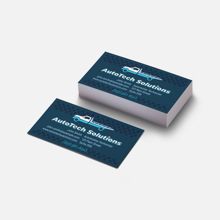 two business cards for autotech solutions on a white surface with blue and black background