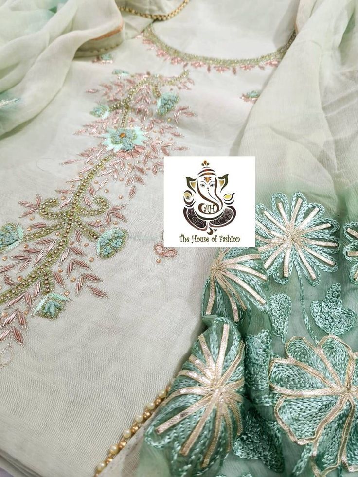 Item Overview ATHARVA Hand Embroidered Salwar Kameez w/Elegant Neck in Light Green(Pista) and w/ Chiffon Dupatta with Aari and Gota work jaal. CH1016 Dno. CH1016 Fabric:  * Shirt Chanderi in Light Green (Pista)  2.5 Mts, with jaal and Side Gota work * Dupatta: Pure Chiffon Dupatta in Pista w/Aari and Gota work 2.5Mts * Bottom Santoon Silk in (Pista) Light Green 2.5 Mts. Excusive Hand Embroidered Party Wear Punjabi Suit. Customization: * Fabrics: Designs Can be made in different Fabrics. * Stitch Pista Green Tissue Silk Kurta For Diwali, Cotton Silk Churidar For Wedding And Diwali, Pista Green Raw Silk Kurta With Resham Embroidery, Pista Green Chikankari Embroidered Cotton Silk Anarkali Set, Pista Green Raw Silk Anarkali Set With Chikankari Embroidery, Pista Green Raw Silk Anarkali Set With Chikankari, Pista Green Chikankari Anarkali Set In Raw Silk, Unstitched Pista Green Tissue Silk Kurta, Designer Cotton Silk Churidar With Zari Work