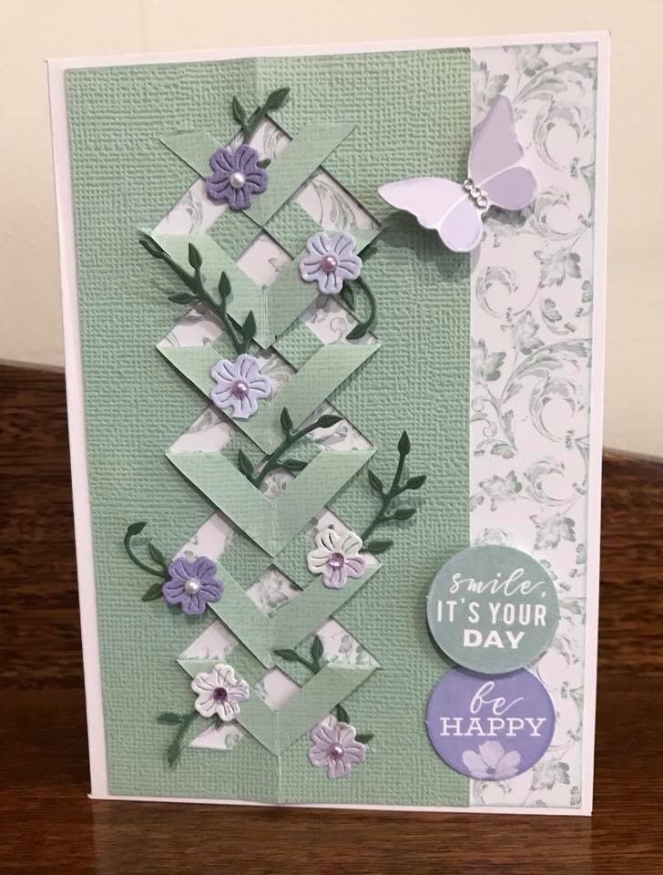 a card with flowers and butterflies on it