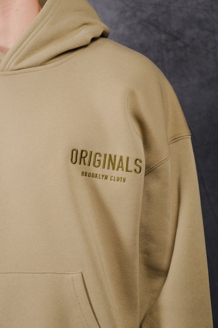 Introducing the Originals Tonal Embroidered Hoodie, part of the Originals Collection. The relaxed fit and ribbed cuffs provide a comfortable and secure fit. The embroidered Originals Logo placement on the front chest adds the right details. The fit is meant to be oversized with a relaxed body and sleeves. Style: BHMH154F Oversized Hoodie Design, Logo Placement, Sleeves Style, Embroidered Hoodie, Jogger Shorts, Oversized Hoodie, Mens Outerwear, Oversize Hoodie, Hoodie Design