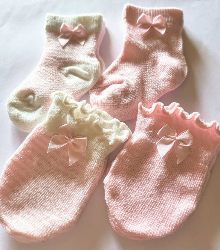 4 piece set of baby socks and matching mittens.  These are darling lil socks and mittens that come in solid pink and pink and white stripes. You will recieve two pairs of socks with matching mittens.  Trimmed with tiny satin bows completes the cutest set.  Perfect for a baby shower gift! This set is for newborns.  They are made of cotton, nylon and spandex. Machine washable and dryable. Will come packaged on a cute cardstock card with a cellophane  envelope for gift giving! 2 complete sets....$1 Pink And White Stripes, Girls Socks, Cute Sets, Baby Socks, Baby Shower Gift, Gift Giving, Pink And White, Baby Shower Gifts, White Stripe