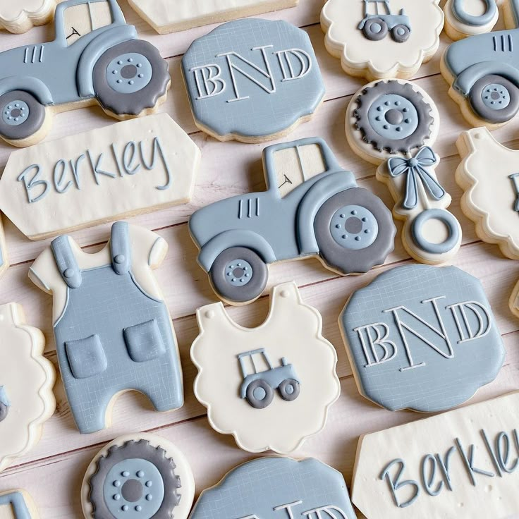 decorated cookies are displayed on a table