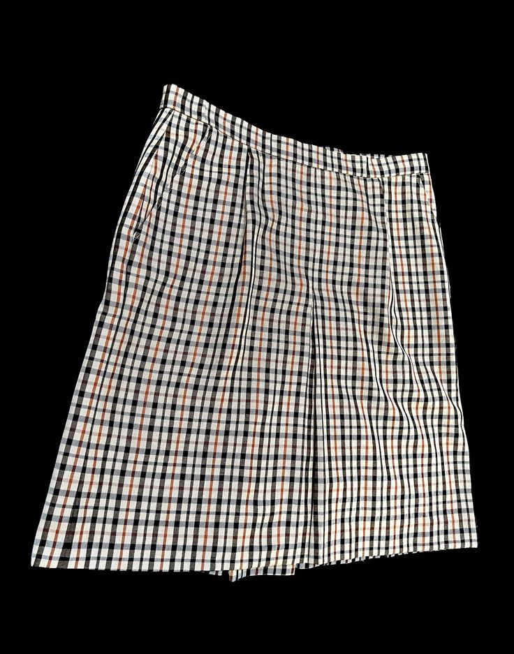 This vintage DAKS London skirt is very classic and timeless in the typical Daks check pattern one Fold on the front and the same on the back, with 2 pockets casual classic British look in size D 40 = GB 14, made in Great Britain Dimensions: Length: c. 22.83 in. (c. 58 cm), waist width: c. 17.72 in. (c. 45 cm) in a very good, well-maintained condition Classic Plaid Cotton Bottoms, Classic Plaid Bottoms With Pockets, Classic Cotton Pencil Skirt, Classic Cotton Skirt, Classic Cotton School Skirt, Classic Plaid Skirt For Fall, Classic Skirt With Pockets For Daywear, Classic Skirt With Pockets For Daytime, Classic Denim Skirt