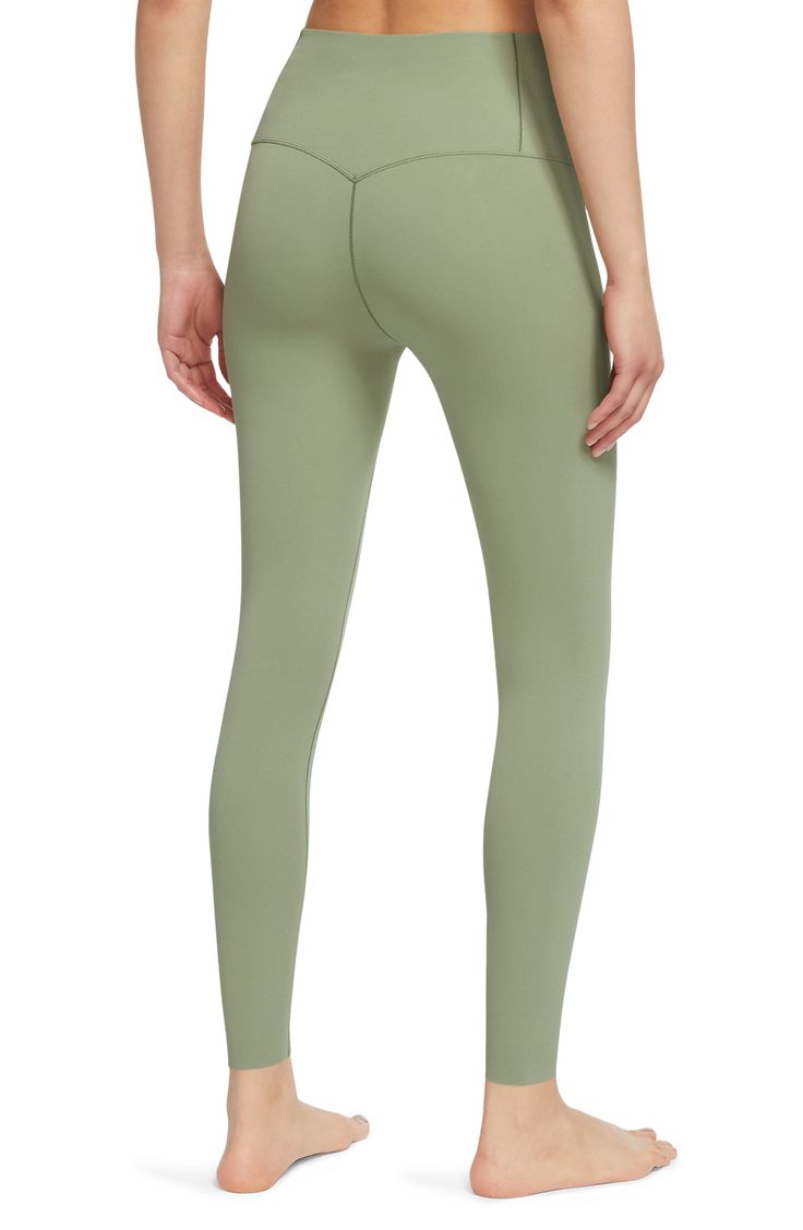 InfinaSoft fabric sits comfortably against your skin in stretchy high-waist leggings that will move with you through every workout and coffee run. 25" inseam; 8" leg opening; 11 1/4" front rise; 13" back rise (size Medium) Lined waistband Dri-FIT moisture-wicking technology 63% nylon, 37% spandex Machine wash, tumble dry Imported Nike Elastane Yoga Bottoms, Compression Leggings With 5-inch Inseam For Yoga, Fall Pilates Leggings With 4-way Stretch, Fall Activewear For Pilates, Nike Yoga Bottoms Full Length, Stretch Nike Yoga Pants, Nike Full Length Yoga Bottoms, Nike High Stretch Moisture-wicking Bottoms, Nike Moisture-wicking High-stretch Bottoms