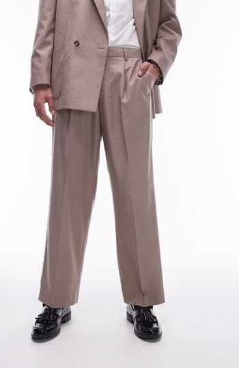 Crisp creases elevate stretch-kissed suit pants that are a sophisticated addition to any office wardrobe. 30 1/2" inseam; 20" leg opening; 12" front rise; 16 1/2" back rise (size 32) Zip fly with hook-and-bar closure Front slant pockets; back welt pockets 84% polyester, 14% viscose, 2% elastane Dry clean Imported Formal Stretch Wide Leg Dress Pants, Formal Wide Leg Work Pants For Spring, Business Stretch Wide Leg Dress Pants, Wide Leg Stretch Dress Pants For Business, Stretch Wide Leg Dress Pants For Business, Tailored Full-length Dress Pants With Pockets, Tailored Full Length Dress Pants With Pockets, Fitted Wide-leg Suits With Pockets, Fitted Wide Leg Suits With Pockets