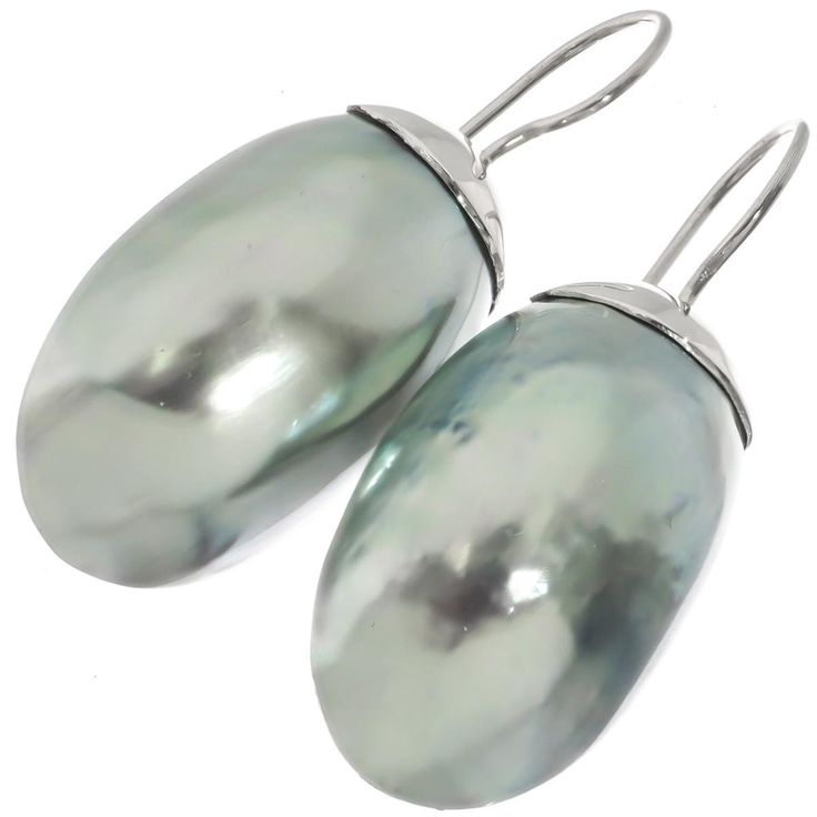 925 Sterling Silver Iridescent Osmena Pearl Nautilus Shell Sterling Earrings, 1 1/4"    Hook Style:  French wires Earring Material:  925 sterling silver Earring Size:  31x17mm(1 1/4x3/4") excl wires. Earring Weight:  ~3 grams/ea Earring Material:  Nautilus shell Formal Silver High Luster Pearl Earrings, Silver Dangle Pearl Earrings With High Luster, High Luster Silver Dangle Jewelry, Formal High Luster Sterling Silver Earrings, Iridescent Sterling Silver Pierced Earrings, Iridescent Sterling Silver Earrings, Iridescent Sterling Silver Earrings For Pierced Ears, Silver Oval Pearl Earrings For Pierced Ears, Silver High Luster Drop Pearl Earrings