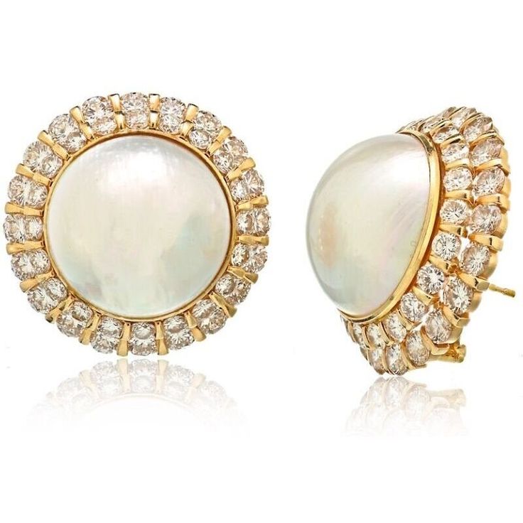 Capture the essence of elegance and sophistication with these exquisite 14K Yellow Gold Mabe Pearl and Diamonds Earrings. Indulge in the luxurious allure of these stunning earrings that will leave you feeling radiant and enchanting.Handcrafted with meticulous attention to detail, these earrings showcase the timeless beauty of mabe pearls. The lustrous round mabe pearl takes center stage, exuding an aura of grace and femininity. Its creamy hue adds a touch of ethereal charm, making it a captivati Luxury Yellow Gold Elegant Pearl Earrings, Luxury Diamond Earrings With Halo Design, Luxury Yellow Gold Earrings With Halo Design, Luxury White Cluster Earrings With Diamond Accents, Luxury Yellow Gold Cluster Earrings With Halo Design, Luxury Yellow Gold Halo Cluster Earrings, Luxury Pearl Earrings With Diamond Accents, Luxury Diamond Earrings With Halo Design For Evening, Luxury Diamond White Halo Bridal Earrings