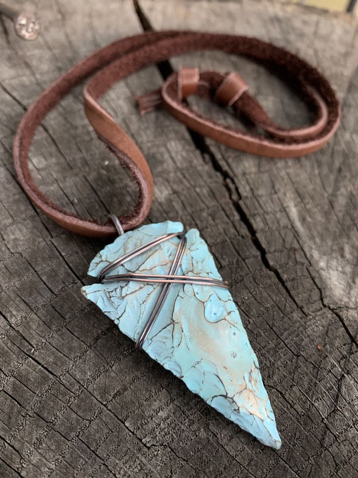 "This is my fresh spin on a wire wrapped classic. Arrowheads have been worn as jewelry for ages and are a recognizable symbol of alertness, walking the straight and narrow & strength. The arrowhead I used is made of jasper stone and is a hand knapped modern replica. It was made in the same tradition and with the same primitive techniques that early man used. I added a lovely pale turquoise & gold highlight patina then wire wrapped it with blackened (oxidized) copper wire. This is a great Handmade Artisan Jewelry With Waxed Cord, Artisan Handmade Jewelry With Waxed Cord, Unique Hand Wrapped Jewelry With Waxed Cord, Unique Hand Wrapped Jewelry On Waxed Cord, Adjustable Southwestern Hand Wrapped Jewelry, Southwestern Hand Wrapped Adjustable Jewelry, Southwestern Adjustable Hand Wrapped Jewelry, Adjustable Southwestern Style Hand Wrapped Jewelry, Bohemian Turquoise Jewelry With Waxed Cord