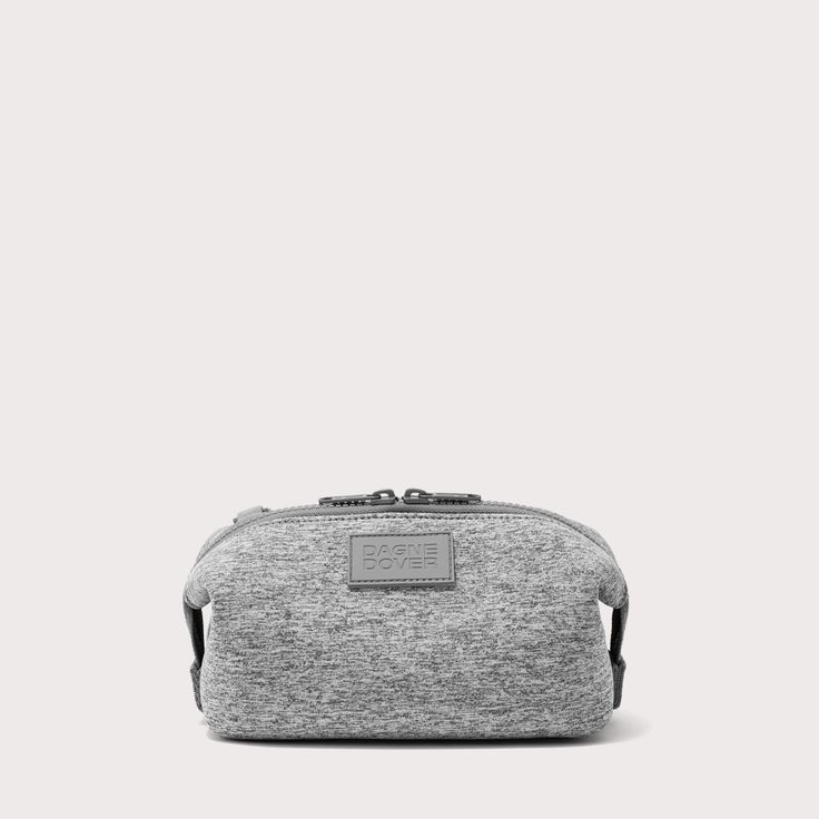 Keep your grooming essentials organized with our Hunter Toiletry Bag. A removable zippered compartment and side slip pocket perfectly hold items like a small comb, contact lens case or tissue packet, while elastic loops cradle items like lip balm, razors or travel fragrance. Throw this small case inside any of our 365 bags for life on the go. We use 100% premium neoprene, a high-tech fabric that is hand washable and quick to dry. Its insulating and shock-absorbent thanks to the material makeup. Functional Rectangular Pouch For On-the-go, Functional Portable Cosmetic Bag For On-the-go, Functional Portable Cosmetic Bag, Functional Portable Compact Cosmetic Bag, Portable Compact Functional Cosmetic Bag, Compact Functional Cosmetic Bag With Zipper, Functional Cosmetic Pouch For Daily Use, Functional Daily Use Cosmetic Pouch, Portable Functional Cosmetic Storage For On-the-go