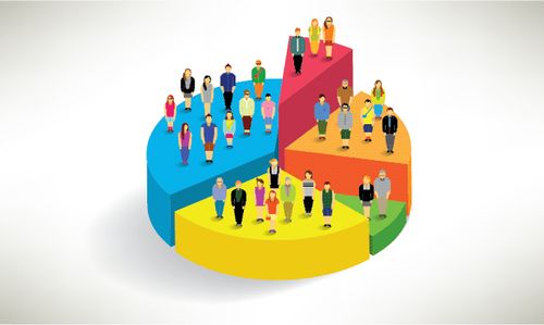 a group of people standing on top of a colorful pie chart with one person in the middle