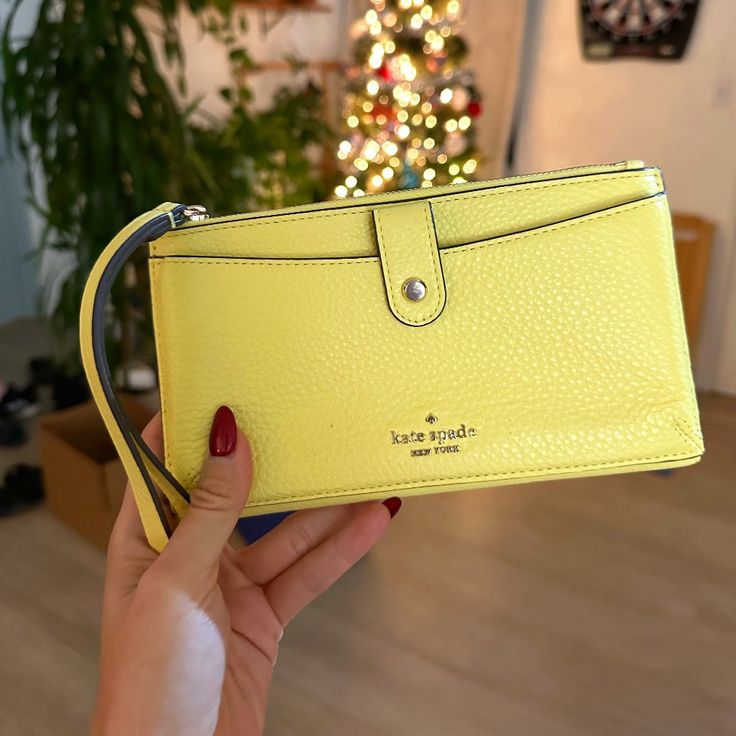 Kate Spade Wallet Brand New With Tag Butter Yellow Color Large And Slim Design, Very Spacious, Soft Genuine Leather Has Wristlet For Convenient Carrying Kate Spade Rectangular Coin Purse For Everyday, Handheld Travel Wallet With Card Slots, Kate Spade Bifold Coin Purse, Everyday Handheld Wallets With Card Slots, Handheld Wallets With Card Slots For Everyday, Handheld Wallet With Card Slots For Everyday, On-the-go Clutch With Card Slots, Everyday Clutch Wallet With Wrist Strap, Trendy Kate Spade Rectangular Wallet