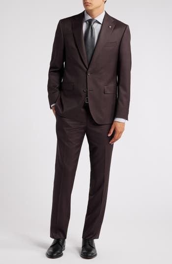 Italian wool styled in a deep, rich burgundy smartens a suit crafted for year-round versatility with traditional notched lapels and tapered flat-front trousers. Top= 28 1/2"; bottom= 36 1/2" inseam; 14 1/2" leg opening; 10" front rise; 16" back rise (size 42) Jacket has notched lapels; chest pocket; flap pockets; side vents Trousers have zip fly with hook-and-bar closure; slant pockets; back button-welt pockets Jacket is lined Unhemmed 100% wool Dry clean Imported Brown Single Button Suit For Work, Timeless Brown Notch Lapel Suit, Brown Suits With Concealed Placket For Workwear, Brown Workwear Suits With Concealed Placket, Brown Suits With Concealed Placket, Brown Slim Fit Suit For Office, Timeless Brown Business Suit, Timeless Suits In Suiting Fabric For Office, Timeless Office Wear Suits In Suiting Fabric