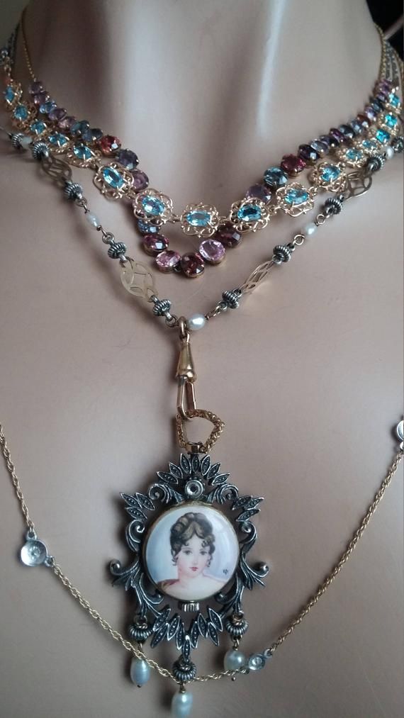 Stunning, Exeptional, Unique, One Of A Kind Necklace with a Watch...Victorian/ Georgian, in very good Antique Condition..Watch frame is Silver and silver dots on the chain is Silver as well..Weight is about 49 Grams 18k Yellow gold / Silver...Chain is 30 inches.Gorgeous Lady Enamel Portrait.Layaway plan is available.. Luxury Vintage Charm Pendant Jewelry, Luxury Gold Necklace With Vintage Charm, Luxury Blue Locket Necklace, Luxury Blue Locket Jewelry, Luxury Yellow Gold Necklace With Vintage Charm, Victorian Necklace With Detachable Pendant, Victorian Necklaces With Detachable Pendant, Collectible Gold Jewelry With Detachable Pendant, Luxury Evening Jewelry With Lobster Clasp