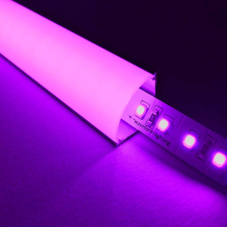 a close up of a purple light on a table