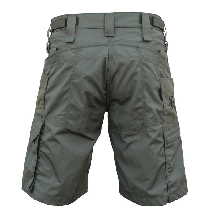 Elevate your range gear with Kitanica's Range Shorts, featuring a sleek, tone-on-tone design with color-matched trim and findings. Crafted from durable nylon/cotton ripstop, these shorts are built to withstand the rigors of the range while offering a polished look. They come equipped with 2 hip pockets, 2 rear pockets, 2 side pockets, and 2 cargo pockets, including reinforced CORDURA® Fabric corners on the hip pockets to prevent knife clip wear. Designed for comfort in hot weather, the Range Sho Khaki Nylon Shorts With Side Pockets, Nylon Combat Bottoms For Outdoor, Combat Hiking Bottoms With Functional Pockets, Khaki Military Shorts For Outdoor Activities, Military Style Khaki Shorts For Outdoor Activities, Techwear Short Bottoms For Hiking, Techwear Shorts For Hiking, Techwear Hiking Shorts, Green Nylon Cargo Shorts