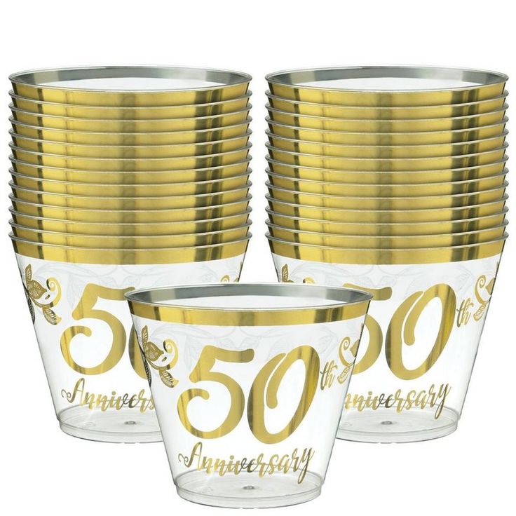 gold 50th anniversary party cups with the number fifty on each cup and 50 in front