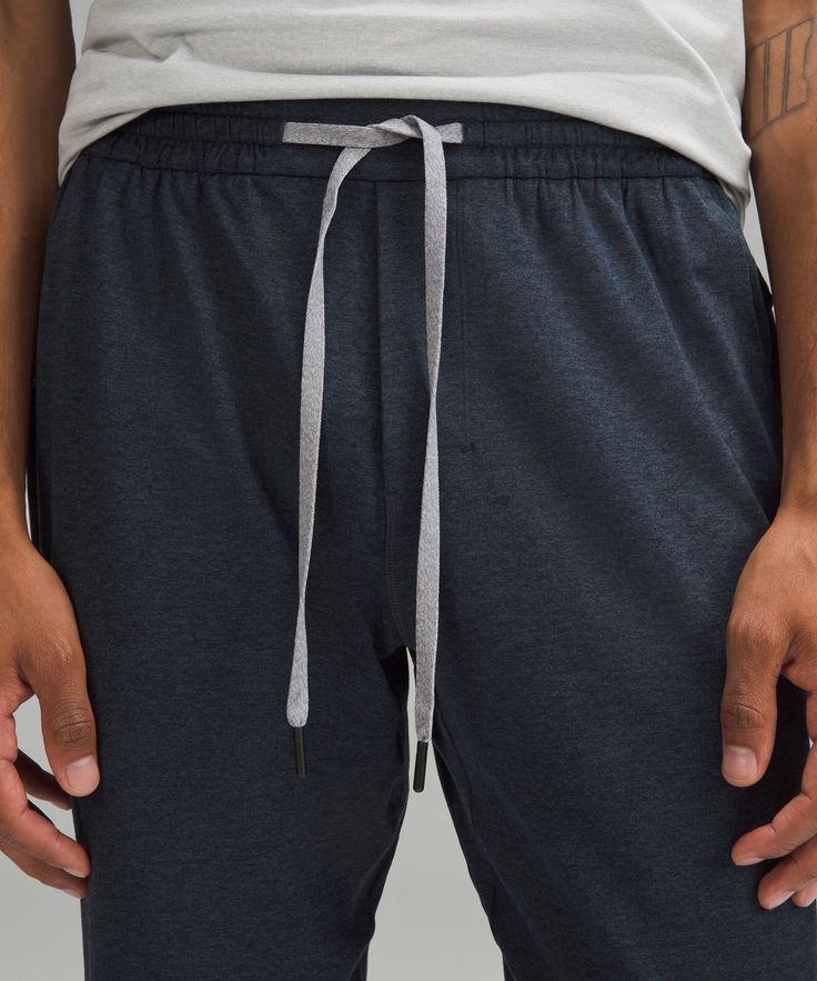 Softness starts here. These lightweight joggers have a brushed interior that makes downtime irresistible. Designed for Casual. Streamlined fit that skims glutes and thighs, then tapers to hem:Intended to sit at ankle for 32"-34" inseam. Hand pockets with hidden phone and coin sleeves. Zippered back pocket. Waistband drawcord can be worn inside or out. Lululemon Relaxed Fit Loungewear Bottoms, Lululemon Stretch Pants For Loungewear, Lululemon Stretch Lounge Pants, Lululemon Casual Pants With Comfort Waistband, Lululemon Stretch Bottoms For Loungewear, Lululemon Casual Long Pants Activewear, Lululemon Casual Sweatpants With Elastic Waistband, Casual Stretch Lululemon Bottoms, Stretch Casual Bottoms From Lululemon